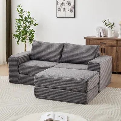 Produktbild von Cord 2-in-1 Schlafsofa mit zwei Kissen, klassischen quadratischen Armlehnen & abnehmbarem Fußhocker, modulares Sofa mit flexibler Konfiguration, dunkelgrau