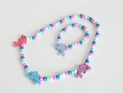 Produktbild von Set Kette und Armband aus Holz Delfin