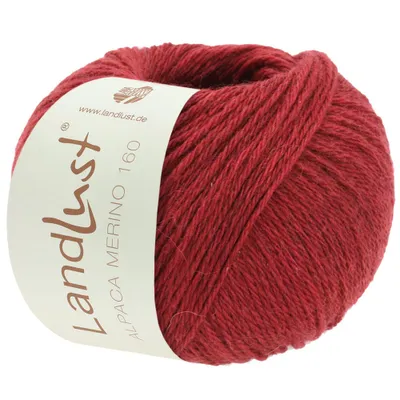 A ball of red yarn with a label.