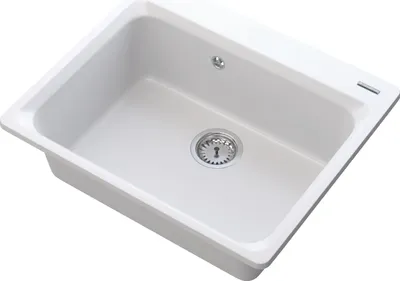 A white kitchen sink with a silver drain.