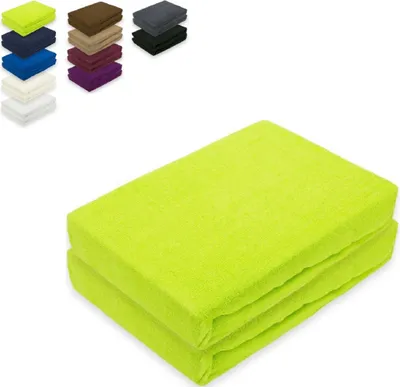 A stack of folded green fitted sheets.