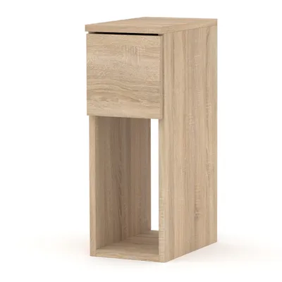 A narrow bedside table with a drawer and an open shelf, made of wood-look material, is shown against a white background.