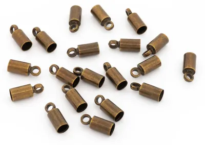 Produktbild von Vintageparts 20 Endkappen antik Bronze 9 x 3,5 mm für 3 mm Bänder