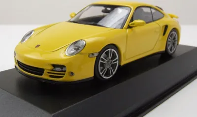 Produktbild von Maxichamps 940069010 Porsche 911 Turbo 2009 gelb 1:43