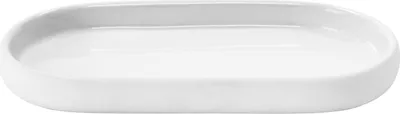 A white ceramic oval tray on a white background.