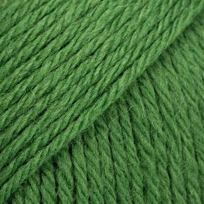 A close-up, detailed view of green yarn.