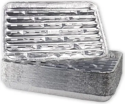 A stack of disposable aluminum grill pans with one pan on top showing the grill grate pattern.