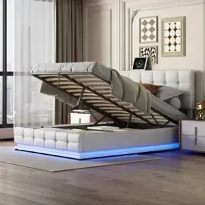 Produktbild von Čalouněná postel Fortuna Lai 140x200 cm s podnožkou a LED osvětlením, hydraulická skříňová pružinová postel s výškově nastavitelným čelem a lamelovým roštem, koženkové dvoulůžko s úložným prostorem pro mladé, bílá barva