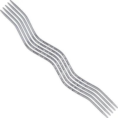 A set of knitting needles arranged in a wavy pattern on a white background.