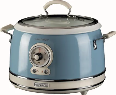 A vintage-style slow cooker is shown against a white background.