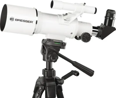 A white telescope mounted on a black tripod against a white background.