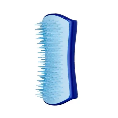 A blue and light blue hair brush is shown against a white background.