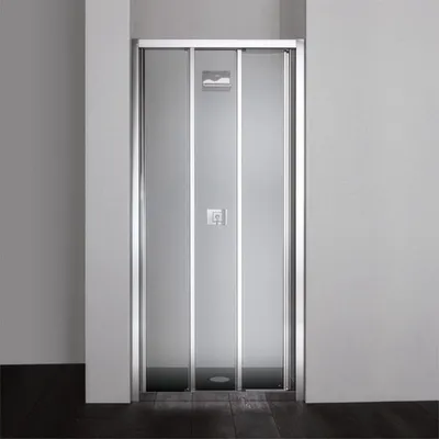 A shower door in a bathroom setting.