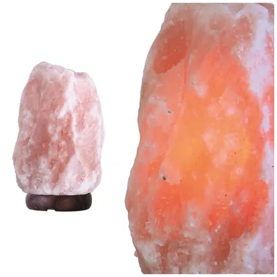 Two Himalayan salt lamps are shown against a white background. One lamp is on the left, smaller and unlit, on a wooden base. The other lamp is on the right, larger and lit from within, glowing orange-red.