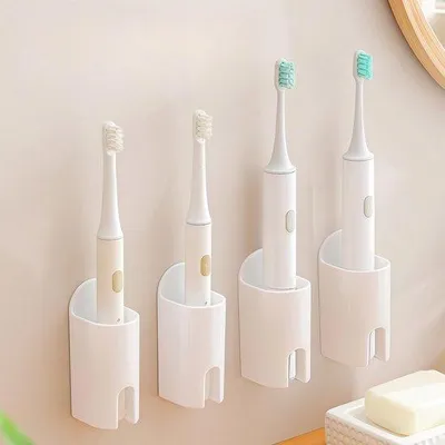 Produktbild von Elektrische Tandreinigerhalter für Bad - Wandhalter für elektrische Zahnbürsten - Selbstklebender Hängehalter - Zahnbürstenhalter an der Wand montiert - 4er Set - Weiß