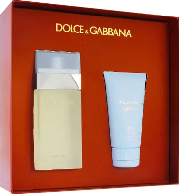 A gift set containing Dolce & Gabbana Light Blue Eau de Toilette and body cream, presented in a red box.