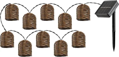 A string of solar-powered LED lights with rattan-style lanterns and a solar panel.