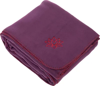 A folded purple fleece blanket with a red lotus flower embroidered on it, placed on a white background.