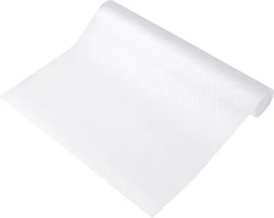 A roll of white, textured shelf liner on a white background.