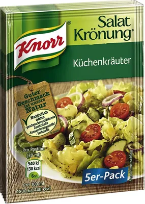 A product package for Knorr salad dressing mix, featuring an image of a prepared salad.