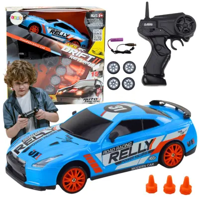 Zdjęcie produktu dla Leantoys – zdalnie sterowany samochód sportowy R/C w skali 1:24, niebieski, z wymiennymi kołami