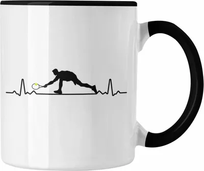 Produktbild von Trendation - Tennis Herzschlag Geschenk Trainer Coach Tennisspieler Geschenkidee Kaffeetasse (Schwarz)
