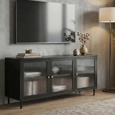 A TV stand with a TV mounted above it, in a living room setting.