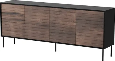 A modern sideboard with a dark top and wooden front panels with horizontal lines, standing on thin black legs.