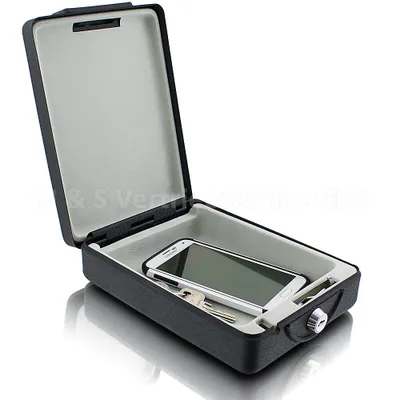 An open safe box with a smartphone and keys inside, shown on a white background.