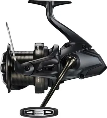 A black fishing reel is shown against a white background.