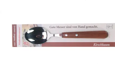 A spoon with a wooden handle is displayed on a white background with packaging.