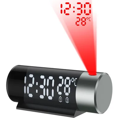 A digital alarm clock projecting the time and temperature onto a surface.