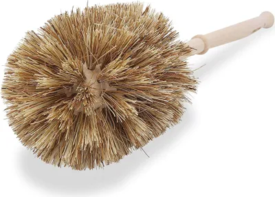 A toilet brush with natural bristles and a wooden handle, isolated on a white background.