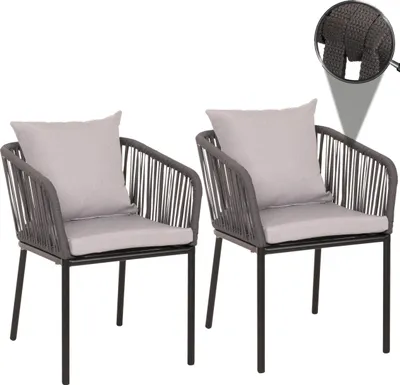 Two outdoor chairs with cushions on a white background.