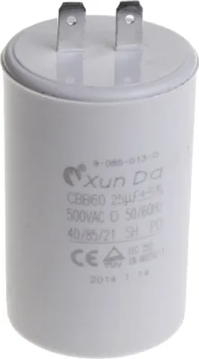 A white capacitor with metal prongs on top, set against a white background.