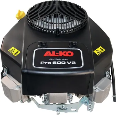 A close-up studio shot of a black engine with red branding.
