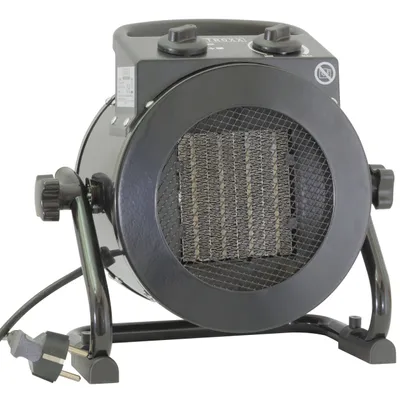 A black electric heater with a stand and power cord, isolated on a white background.