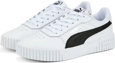A pair of white Puma sneakers with black accents.