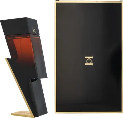 A perfume bottle and its box are displayed side-by-side against a white background.
