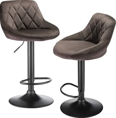Two brown velvet bar stools with black metal bases and adjustable height.