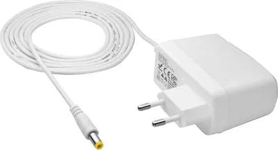 A white power adapter with a coiled white cable and a yellow connector.