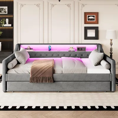 A daybed with LED lighting and USB ports in a bedroom setting.