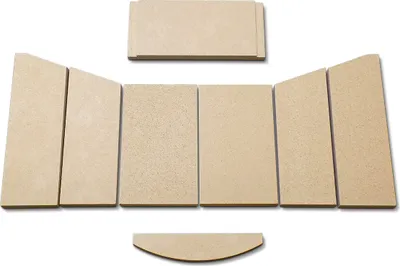 A set of beige firebricks arranged in a fan shape on a white background.