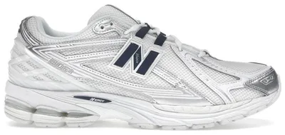 Immagine prodotto di New Balance 1906R, colore bianco, blu navy e argento metallizzato - taglia EU 38.5