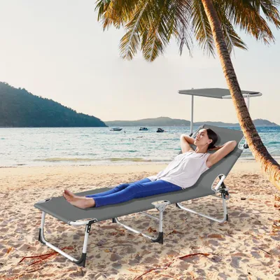 Productafbeelding van UISEBRT Anthraciet inklapbare strandstoel met een 360° verstelbaar zonnescherm, een rugleuning die in 4 standen verstelbaar is, en gemaakt van PE Oxford-stof met een zijvak, geschikt voor tuin en strand