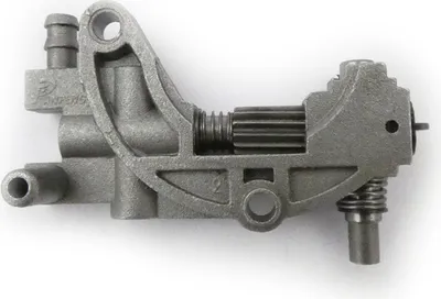 A close-up studio shot of a metal oil pump for a chainsaw.