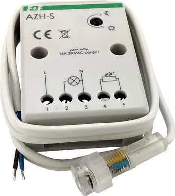 A close-up of a light sensor switch with wiring and a probe.