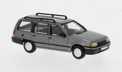 Produktbild von Brekina PCX870498 - 1/87 Opel Kadett E Caravan, grau, 1989 - Neu