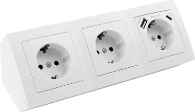 A white, three-socket power strip with integrated USB-A and USB-C ports, shown from a diagonal angle against a white background.