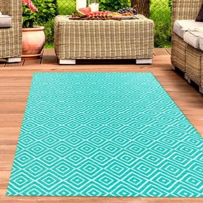 Produktbild von Stilvoller Outdoor-Teppich mit klassischem Rautenmuster in petrol Größe - 150 x 220 cm